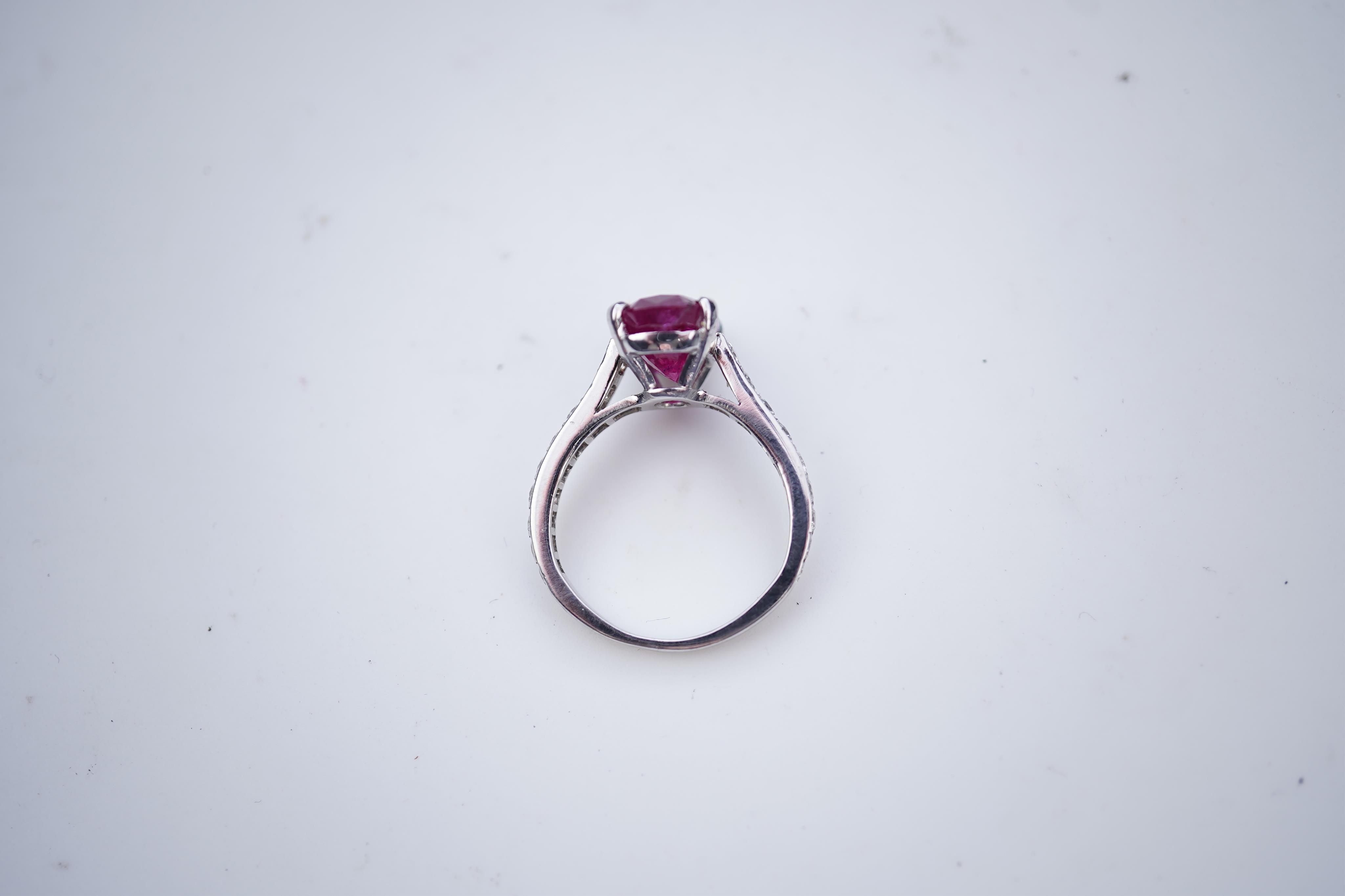 An attractive unheated ruby and diamond ring